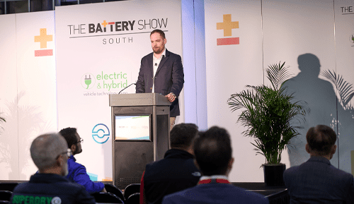 A gentleman speaking at a podium