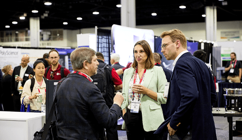 Two men and a woman talking